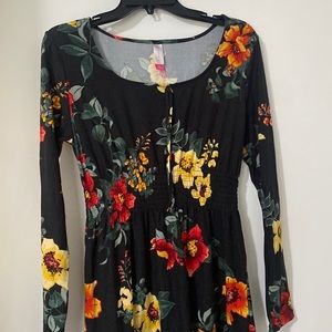 Black No Boundaries dress with floral patterns
